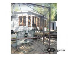 TERRAIN CAMPING AVEC ROULOTTE PUMA À VENDRE ZEC LAVIGNE ST-ZÉNON